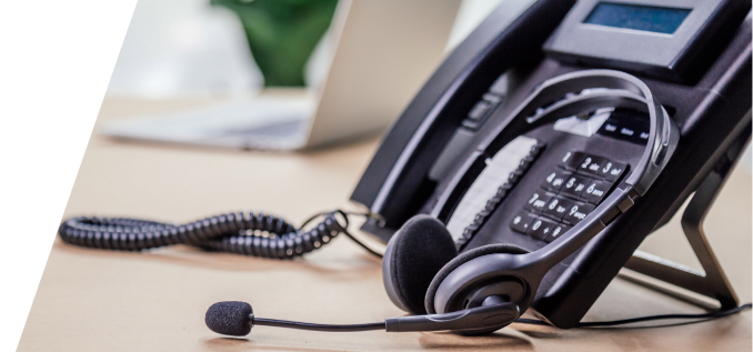 Desk telephone and headphone headset